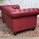 Chesterfield 2-seater leather sofa, modern production from the 2000s.