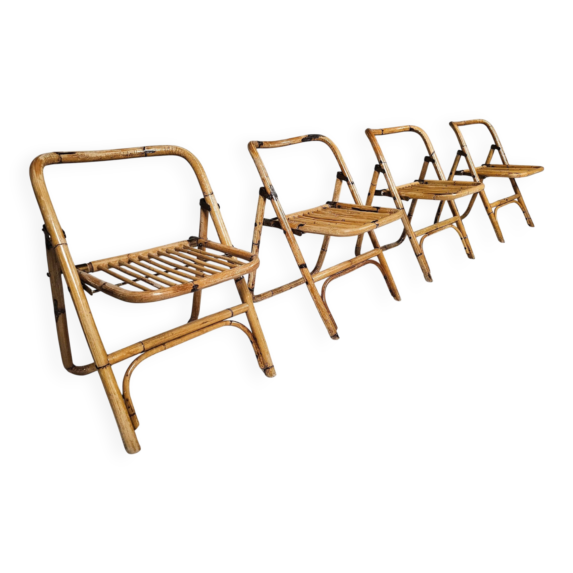 Set of 4 Dal Vera bamboo folding chairs, brass details, Italy, 1960s.