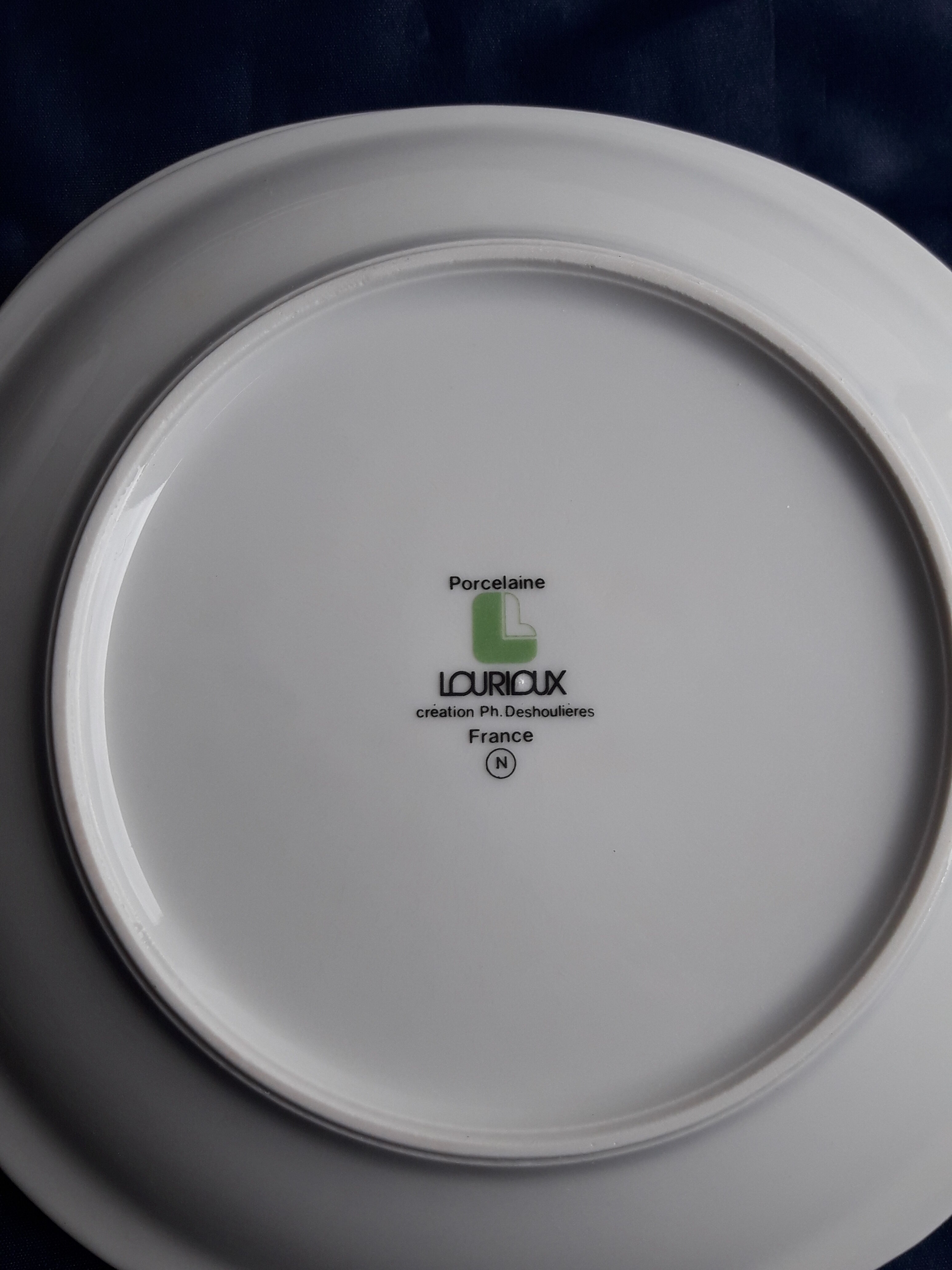 Lourioux porcelain raclette service created by Philippe Deshoulières