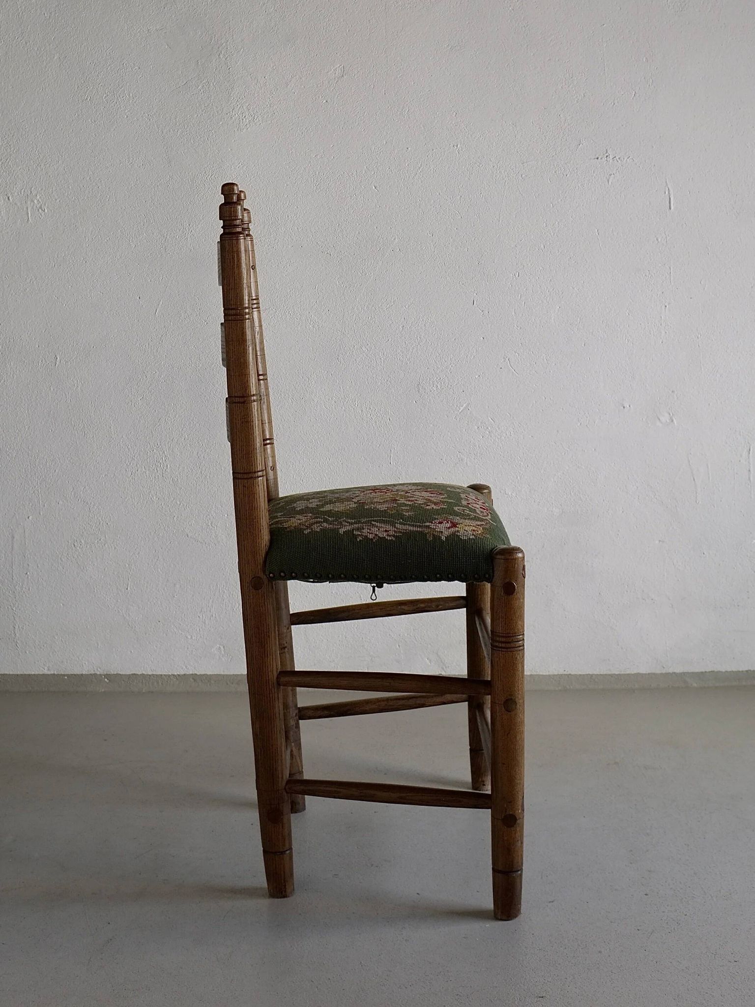Rustic ladder-back oak chairs with embroidered seats | Netherlands | 1950s