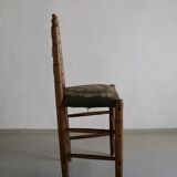Rustic ladder-back oak chairs with embroidered seats | Netherlands | 1950s