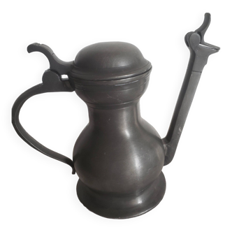 Pewter jug / pitcher, lid and a flap on the pourer with beautiful rounded shapes