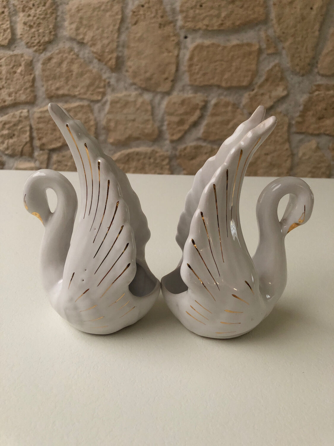 Pair of ceramic swans