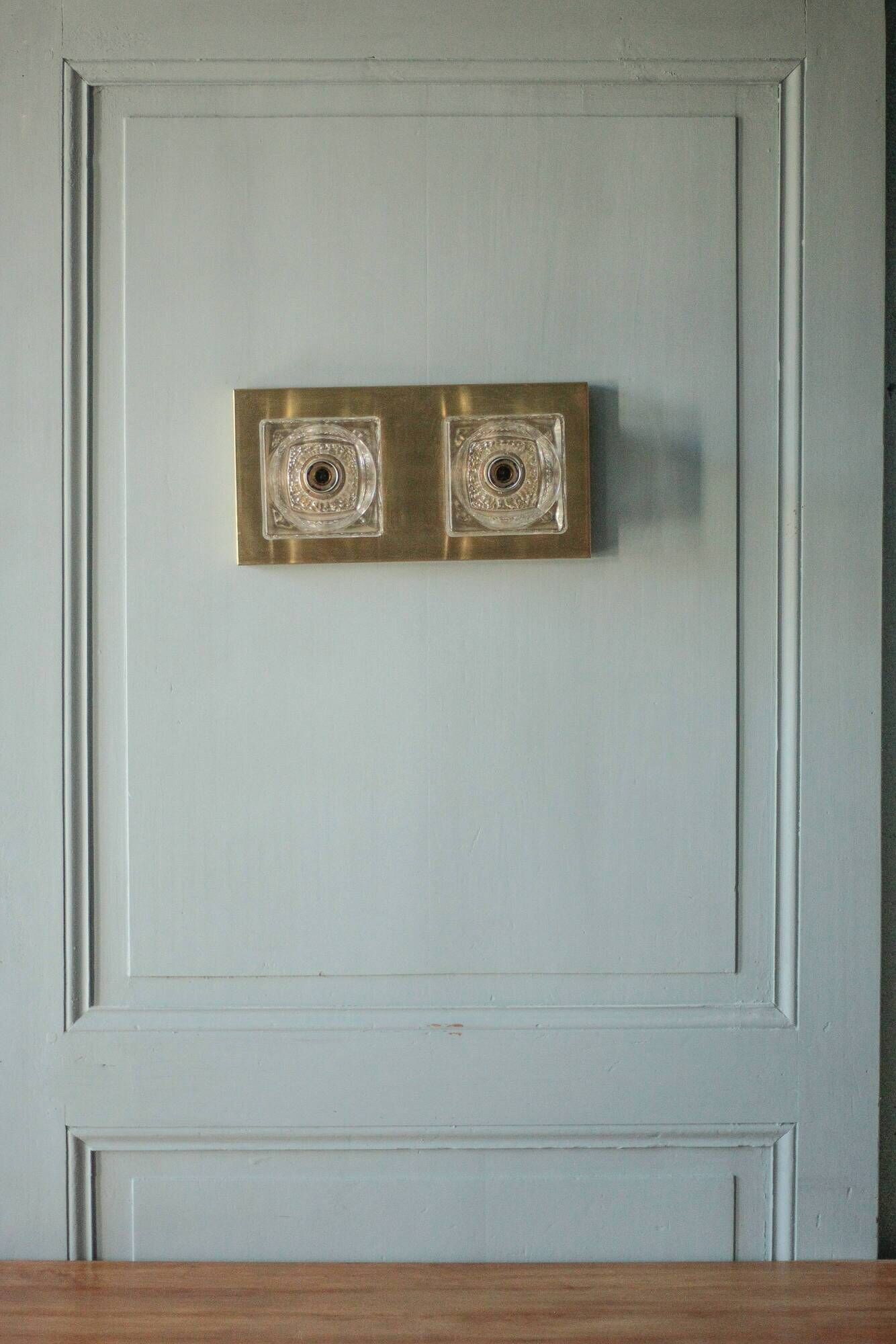 Peill & Putzler wall light, vintage, brass and thick glass wall sconce.