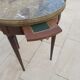 Gray marble mahogany pedestal table and brass gallery