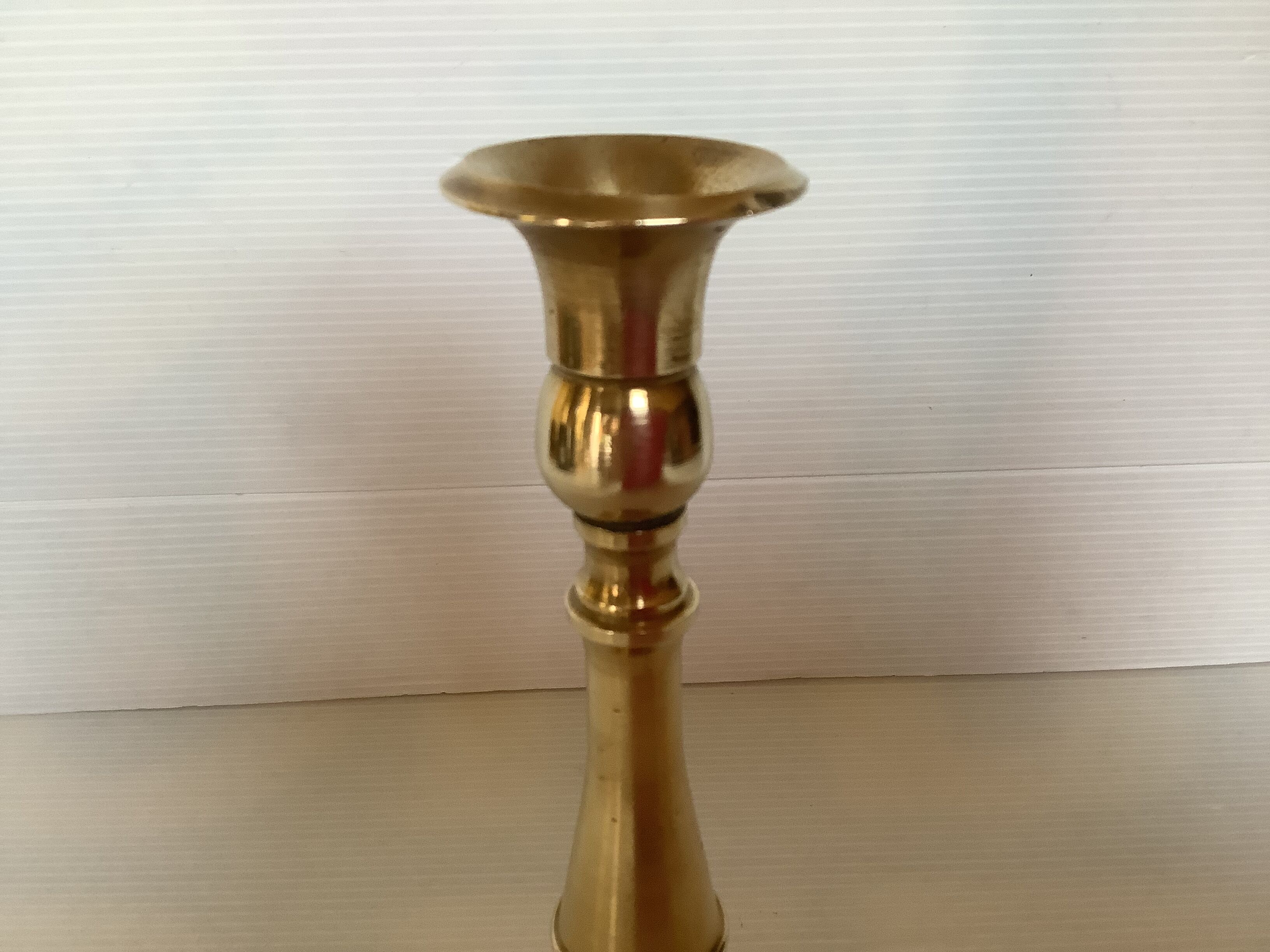 Pair of brass candle holders