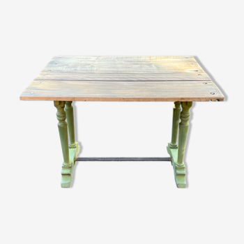 Old table patinated green legs