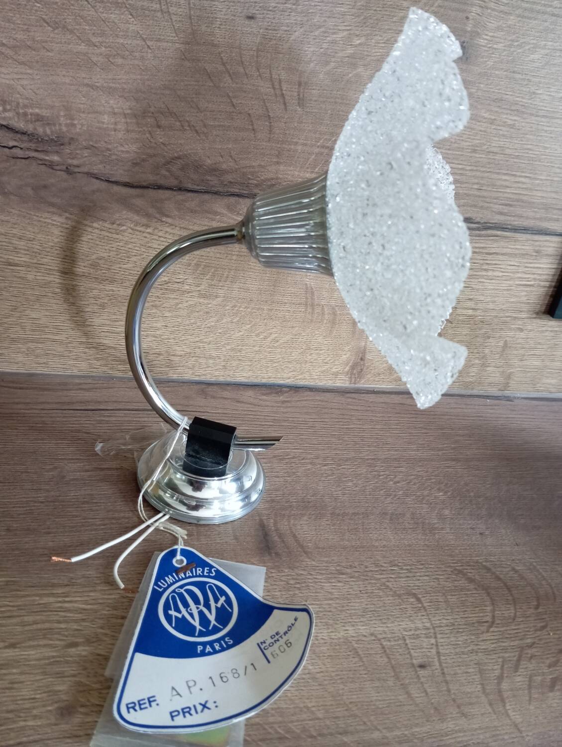 Vintage silver metal wall light and perpex corolla