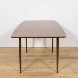 Extendable teak dining table in Mid-Century style from McIntosh, UK.
