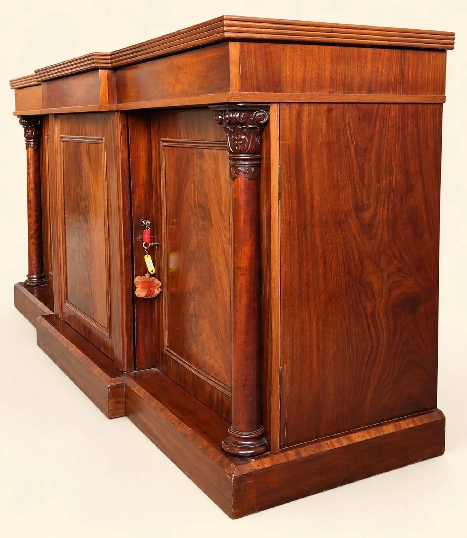 Large buffet in flame mahogany, William IV / Regency columns.