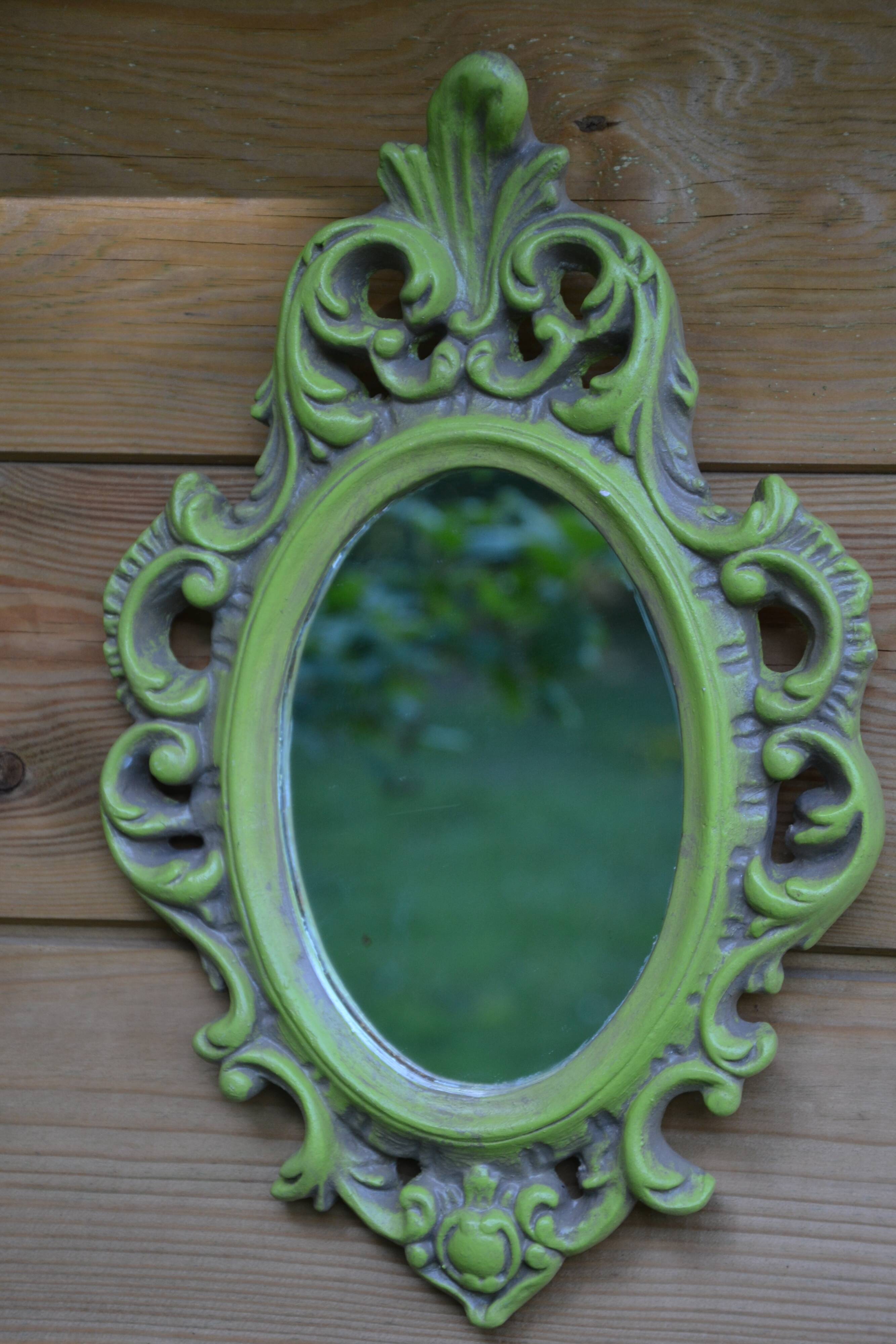 Small green wooden mirror