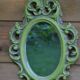 Small green wooden mirror