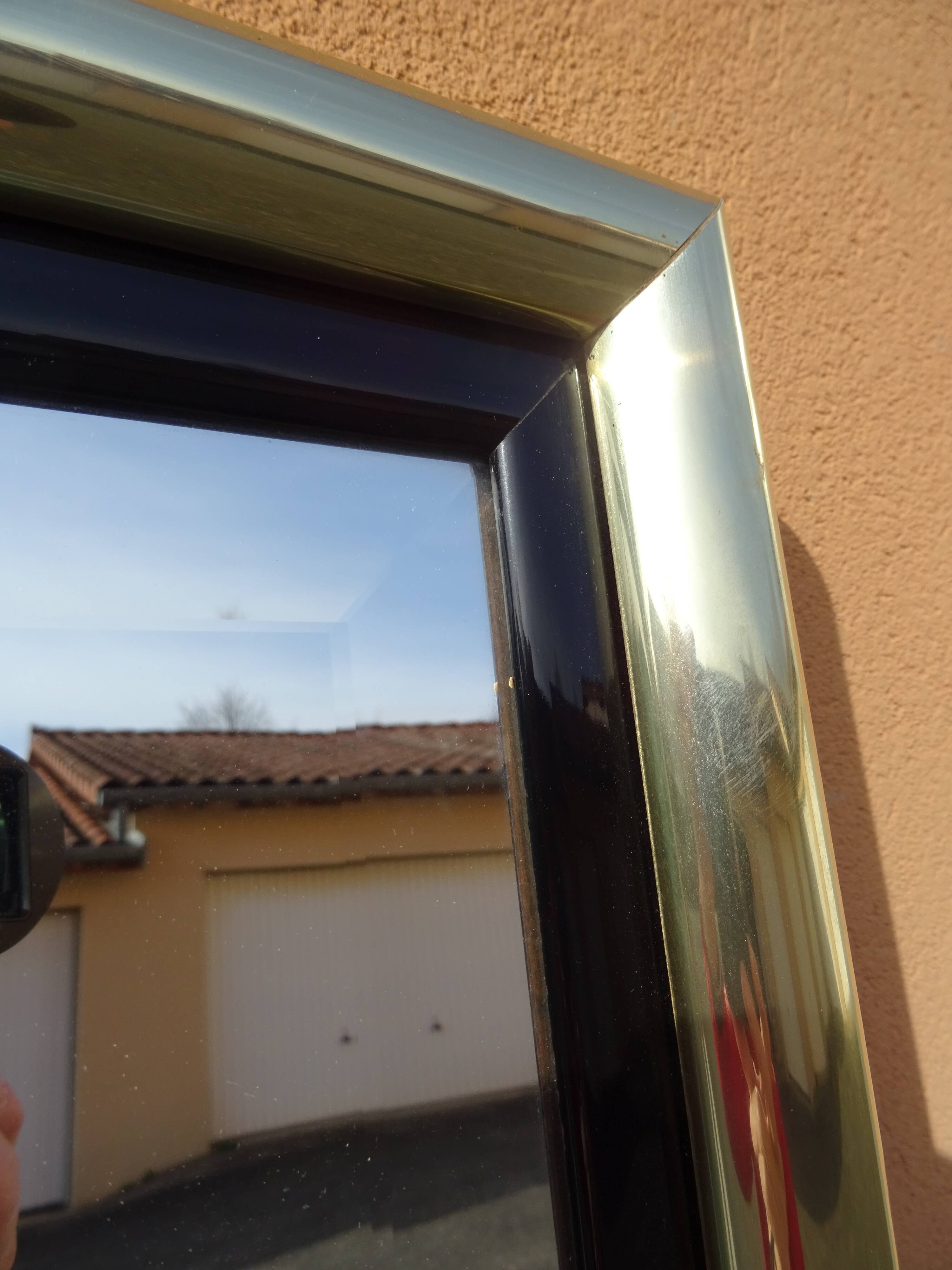 Brass and plexiglass mirror, 80s design