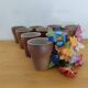 Stoneware cups – Armor stoneware set of 10 and an 11th French stoneware cup.