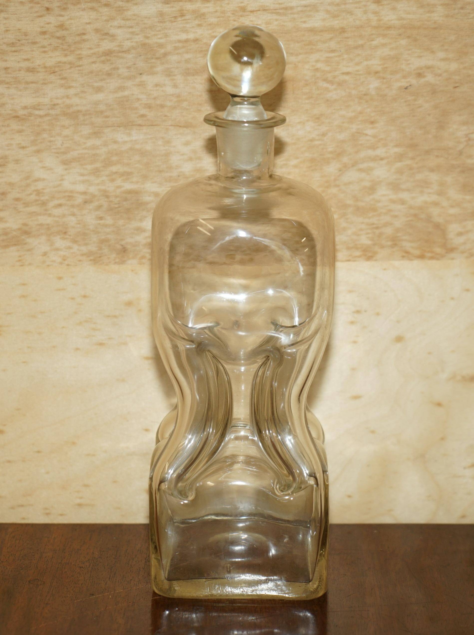 Pair of antique pinched decanters circa 1900 for serving whisky, bourbon, vodka, gin.