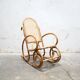 Fauteuil à bascule vintage en rotin et cannage
