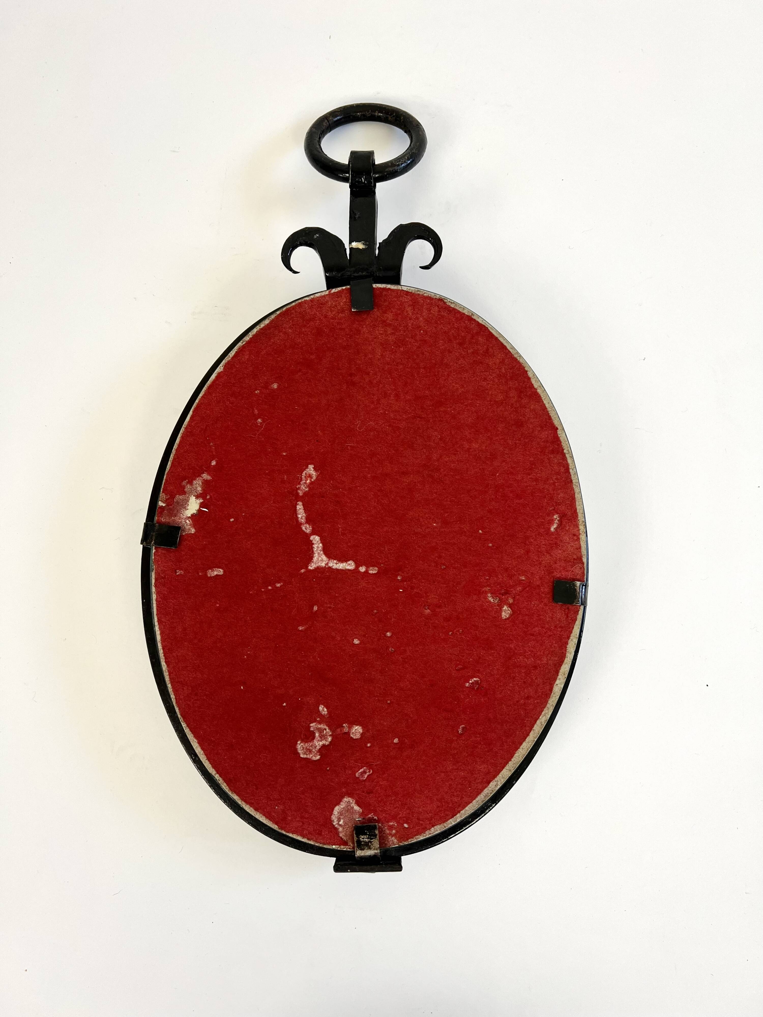 Miroir mural ovale brutaliste du milieu du siècle
