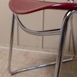 Red plastic-seat stacking chair with chrome frame by Paolo Favaretto for Assisa (Italy 1986) – vintage design