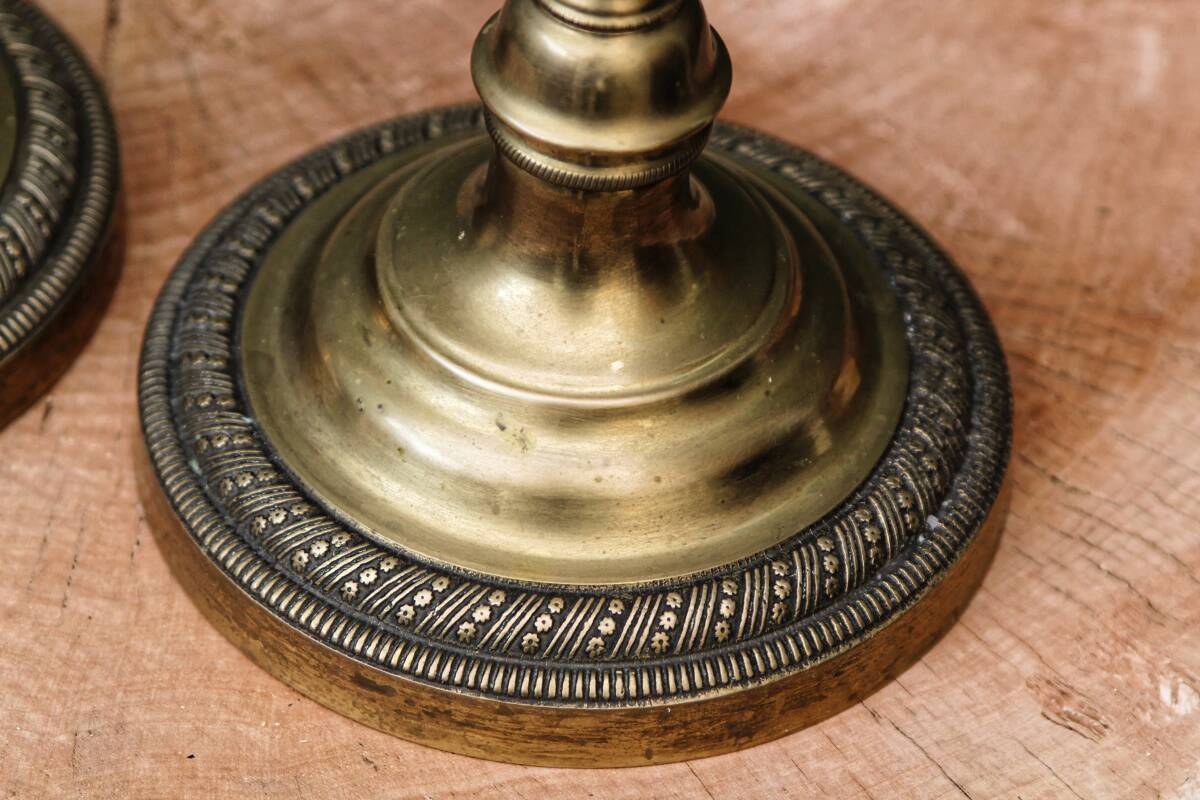 Pair of guilloché bronze candlesticks