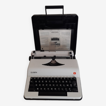 Machine à écrire  portable vintage  , fonctionnelle ,  Erika, ruban encreur neuf