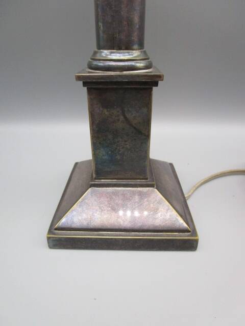 Old lamp base in silvered bronze, column shape