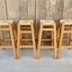 Lot de 4 tabourets hauts en bois avec assise paillée