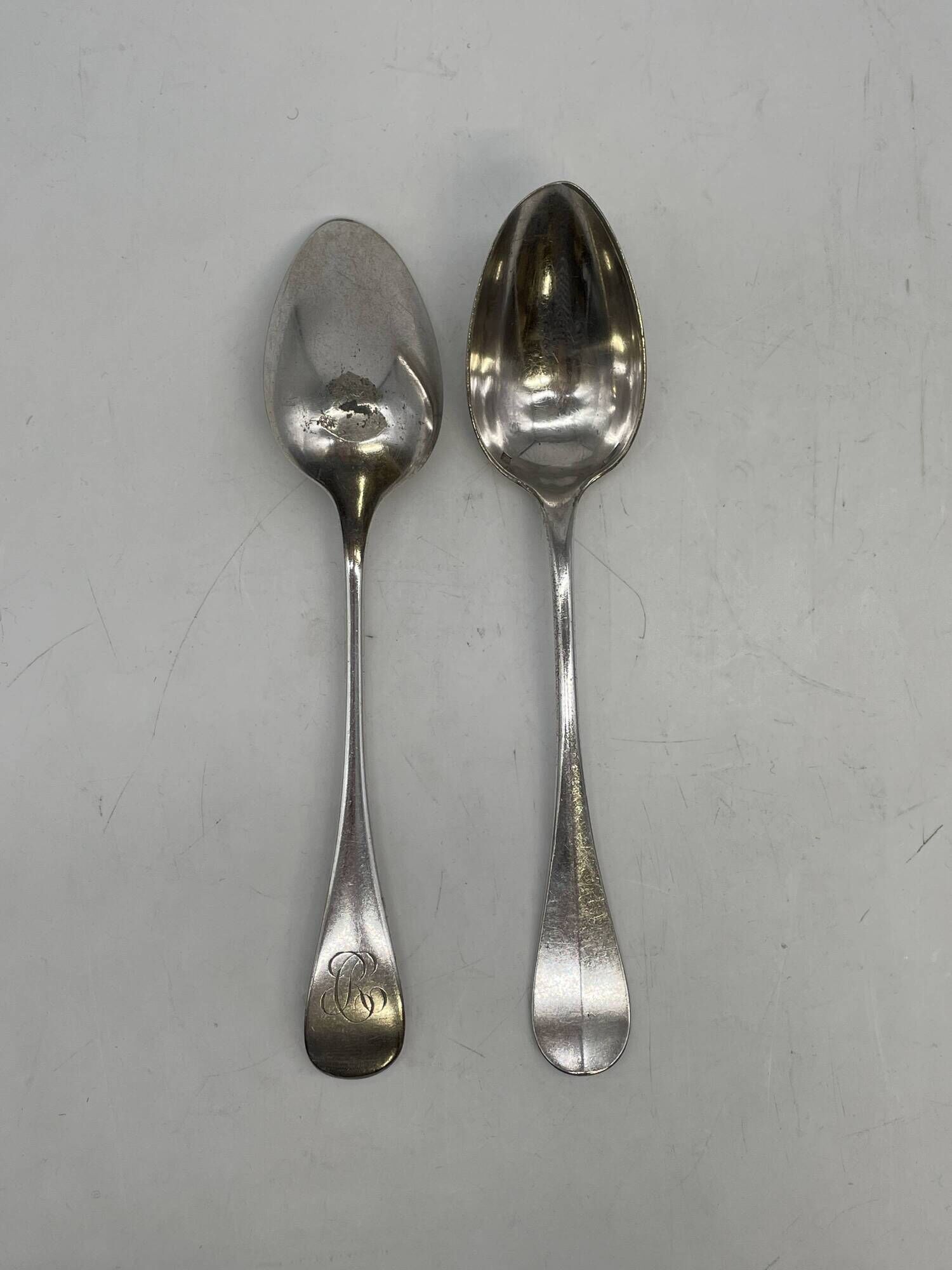 Set of 2 soup spoons and 5 lunch forks by Christofle.