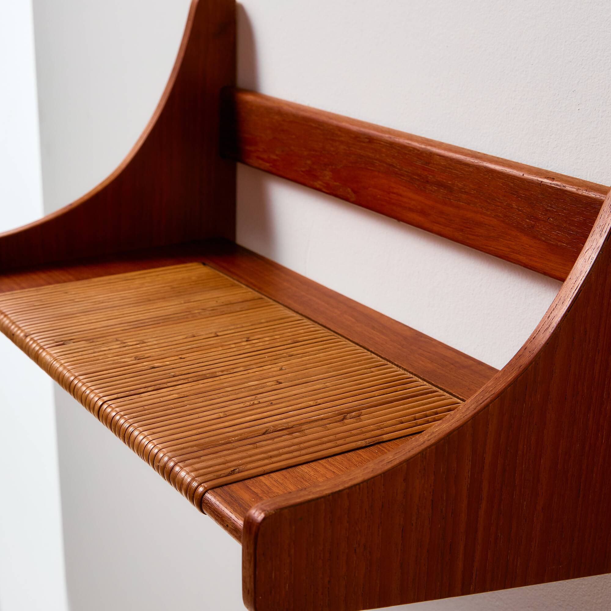 Teak wall shelf with cane details