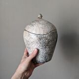 Handmade raku ceramic pot in contemporary Japandi design.