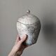 Handmade raku ceramic pot in contemporary Japandi design.