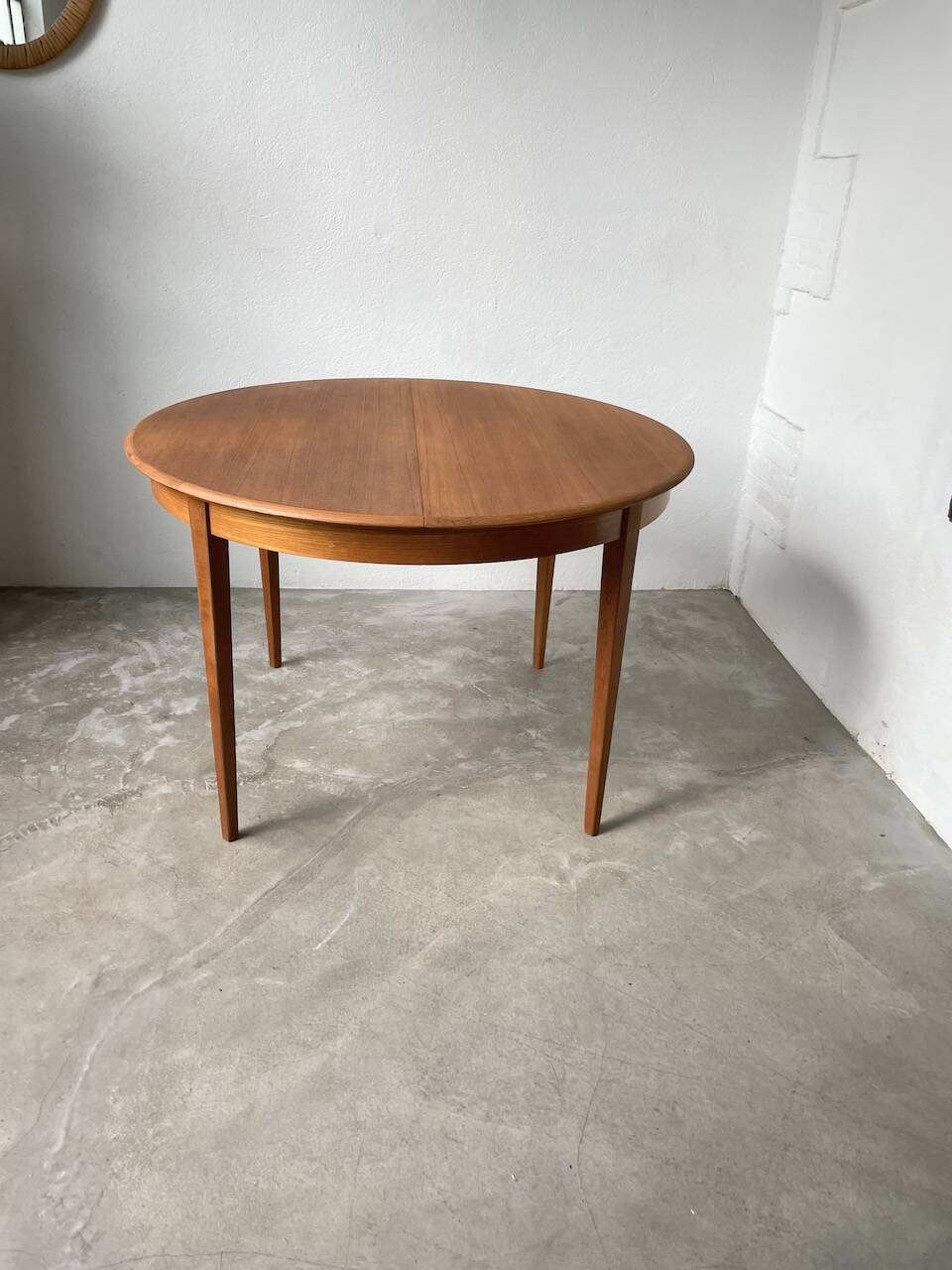Scandinavian round teak table with extension
