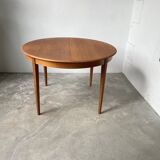 Scandinavian round teak table with extension