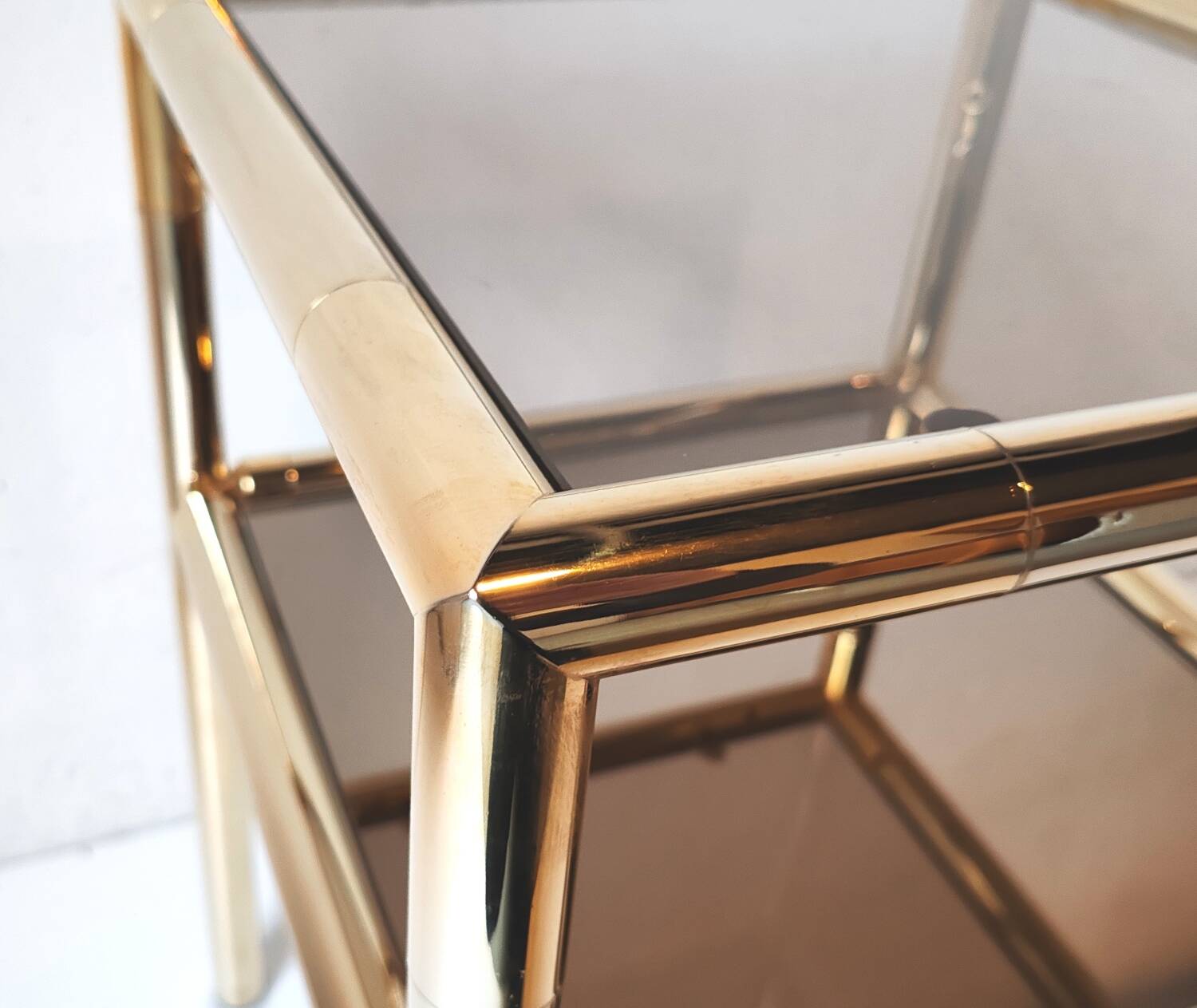 Brass and glass end table from the 70s