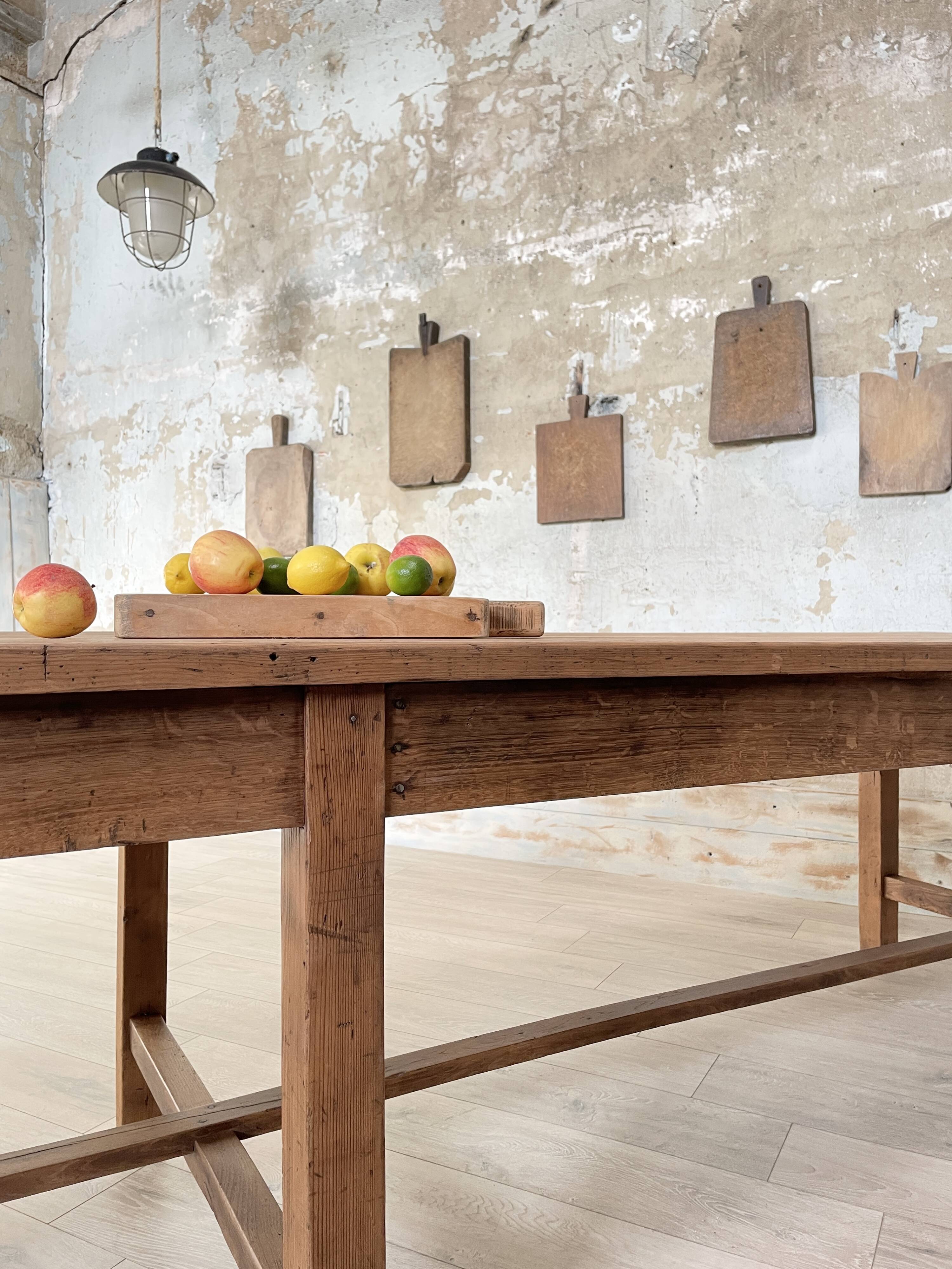 Solid wood workshop table with straight legs.