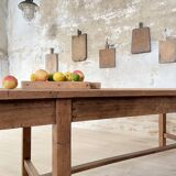 Solid wood workshop table with straight legs.