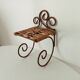 Antique wrought iron wall shelf