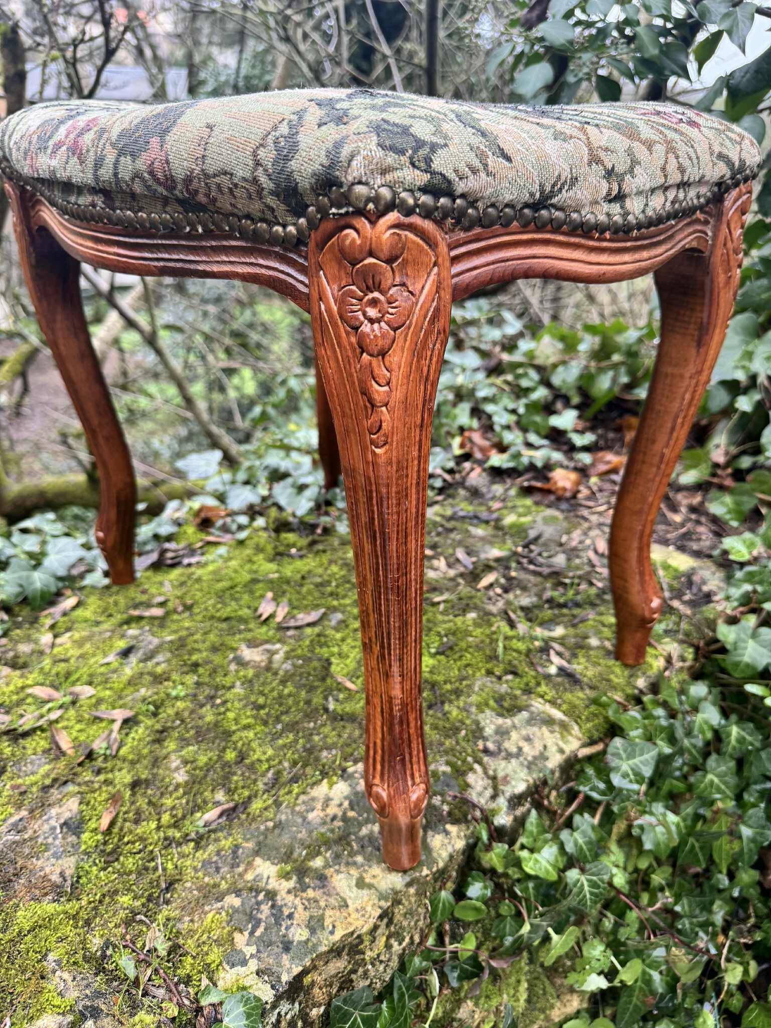 Large antique footrest in the Louis XV style.