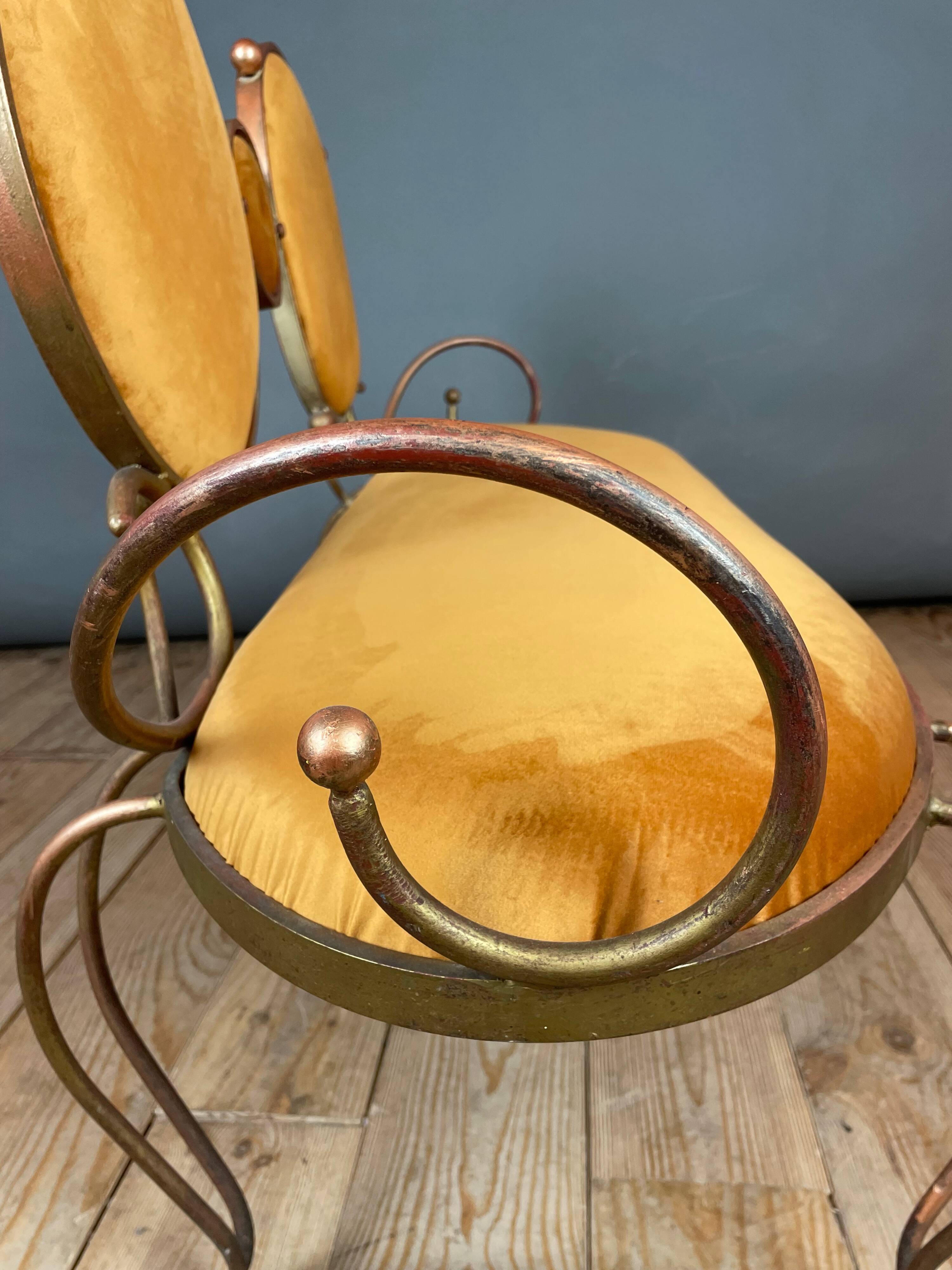 Wrought iron and velvet sofa
