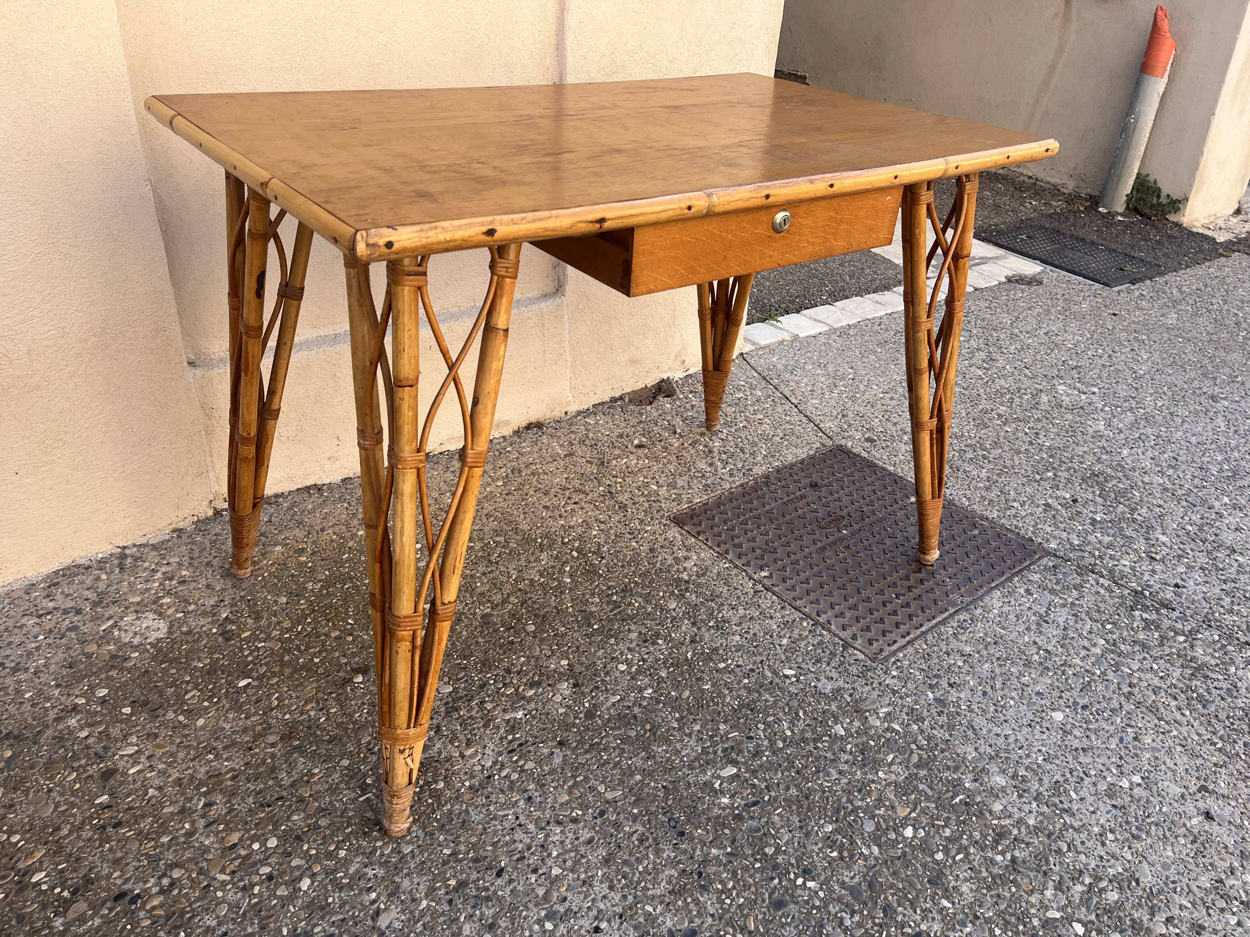 vintage 1960s rattan desk with Eiffel Tower legs