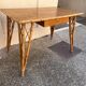 vintage 1960s rattan desk with Eiffel Tower legs