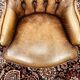 Fauteuil Chesterfield anglais en cuir marron