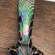 Vintage iridescent glass vase with ribbed design and ruffled neck, H 21 cm.