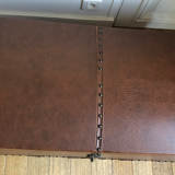 Ancient wooden and faux leather trunk