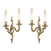 Pair of antique wall sconces from the 1920s in gilded bronze.