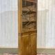 19th-century English corner cabinet in oak, mahogany, and fir.
