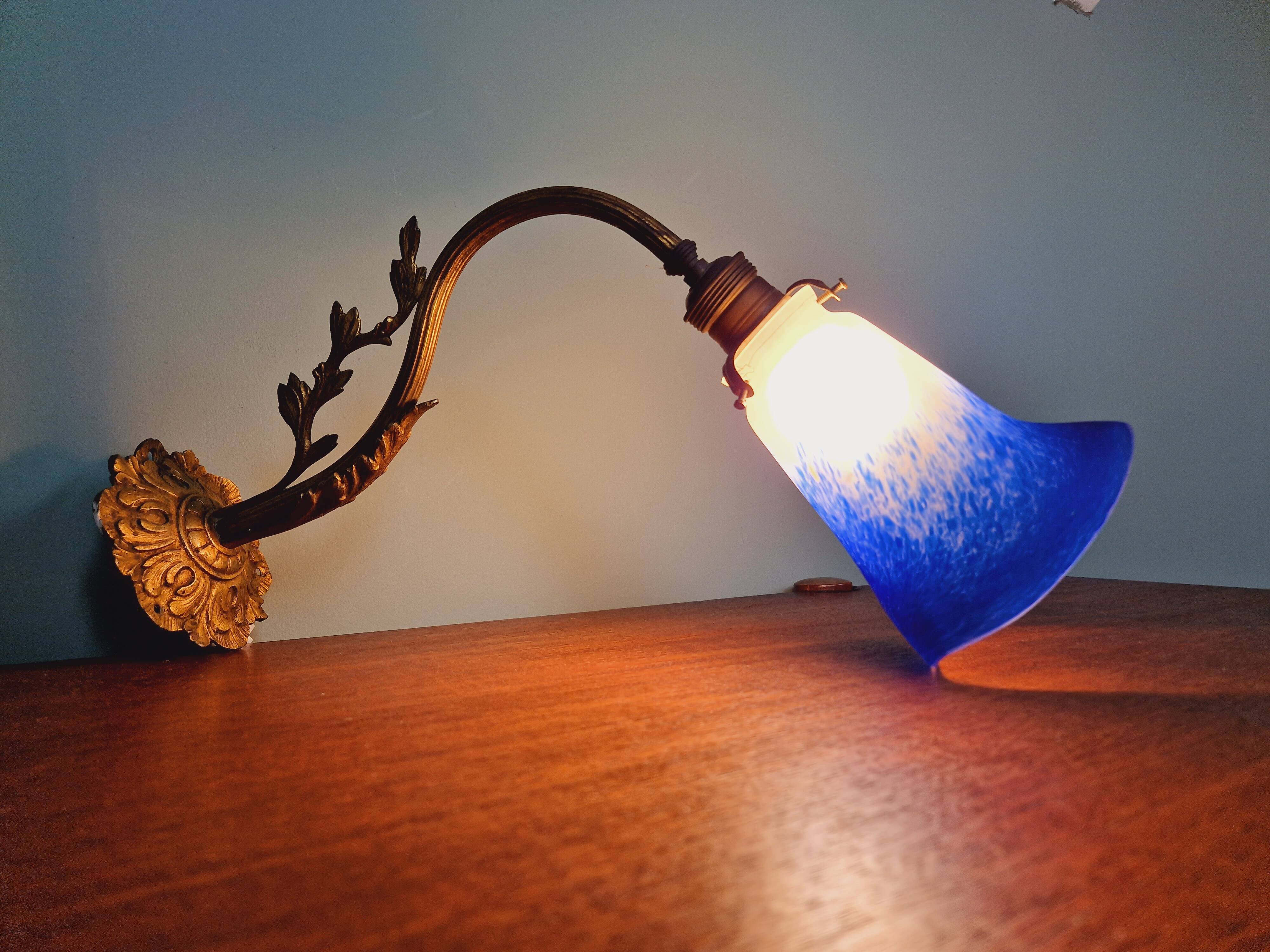 Wall light in gilded bronze and blue marmoreal glass, early 20th century