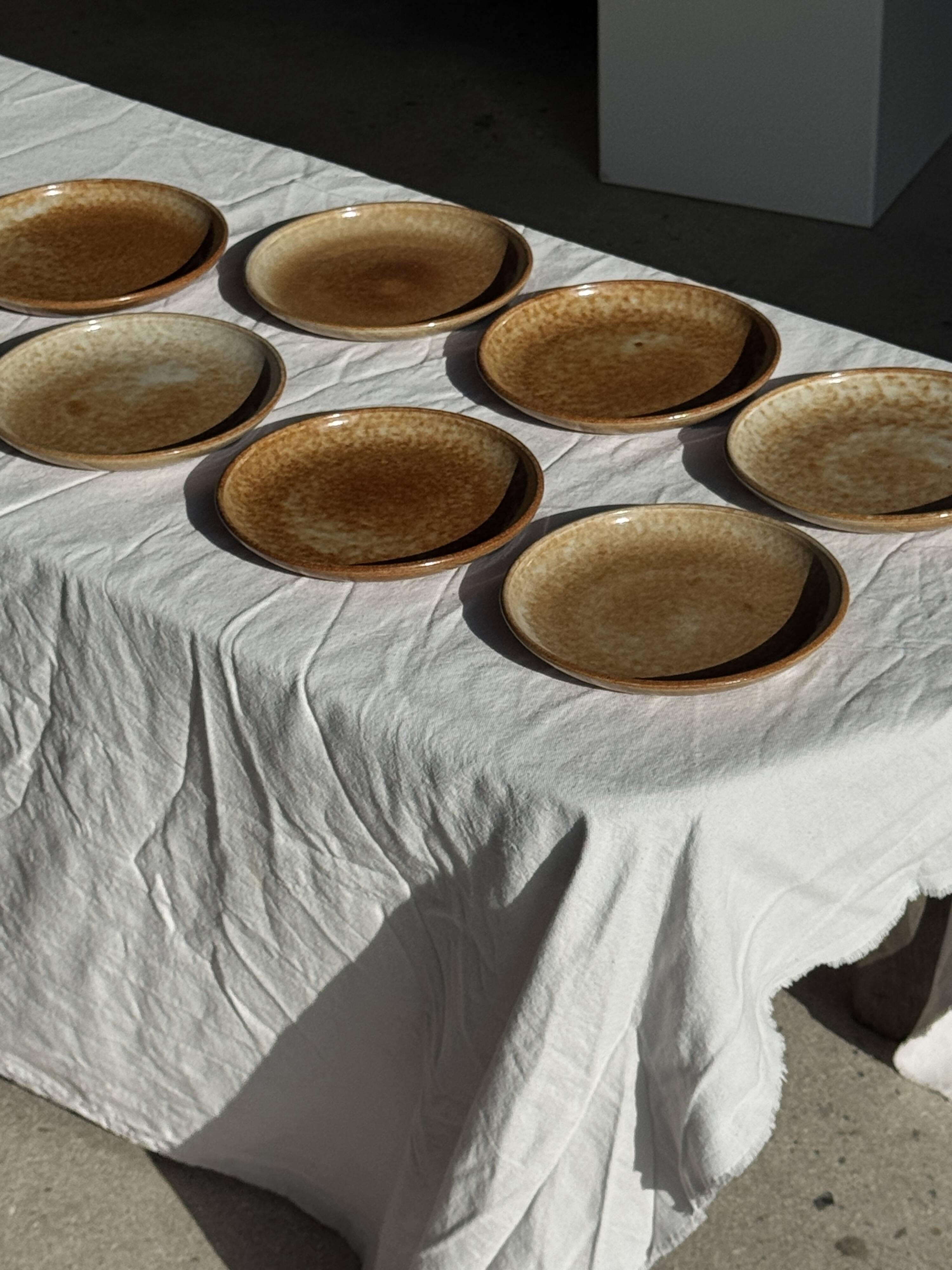 Set of 7 small flat dessert plates in orange stoneware D18