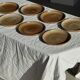 Set of 7 small flat dessert plates in orange stoneware D18
