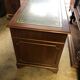 English pedestal desk with green leather top