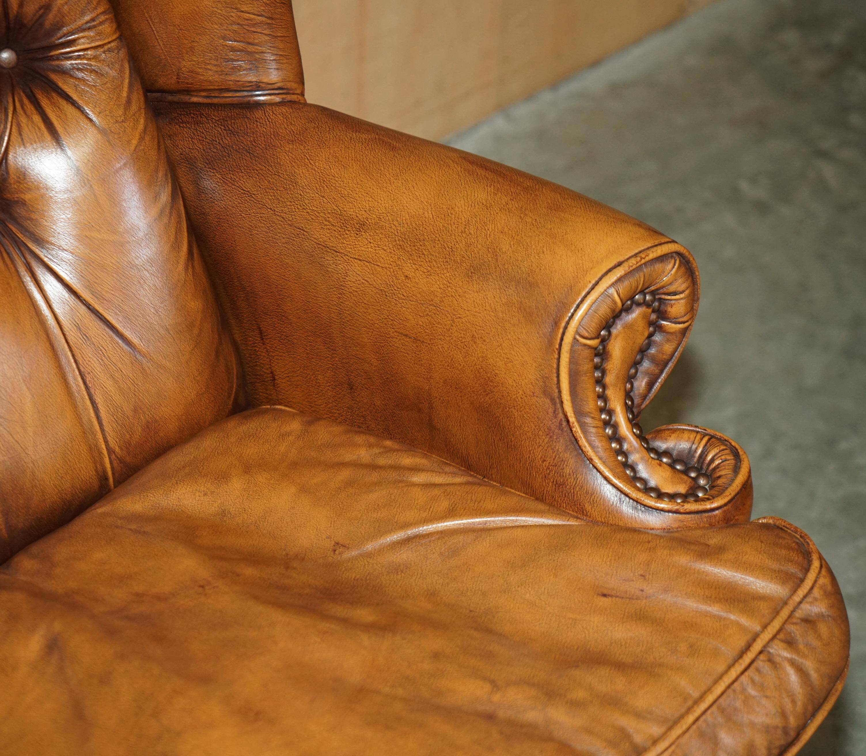 Captain's chair Chesterfield vintage leather with tufted wingback.